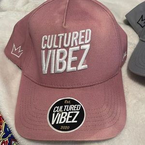 Cultured vibez pink hat.